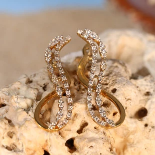 Brinco Ondas Cravejado Com Diamantes Em Ouro Amarelo